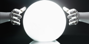 A pair of robot hands surrounds a bright ball. 