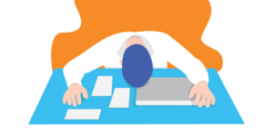 Man sitting with his head face-down on a desk