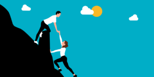 One person helping another climb a mountain.