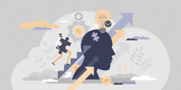 A person carrying a puzzle piece up a staircase to finish the puzzle inside a large head