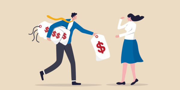 A person in a suite and tie running away with giant price tags.