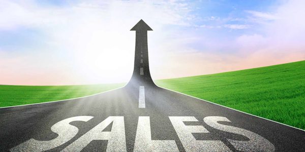 Sales is written in capital letters at the start of a road that ends in an arrow pointing upwards.