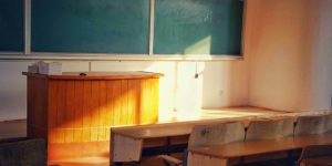 An empty classroom with sunlight shining through.