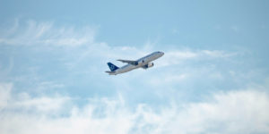 An airplane flying in the sky.