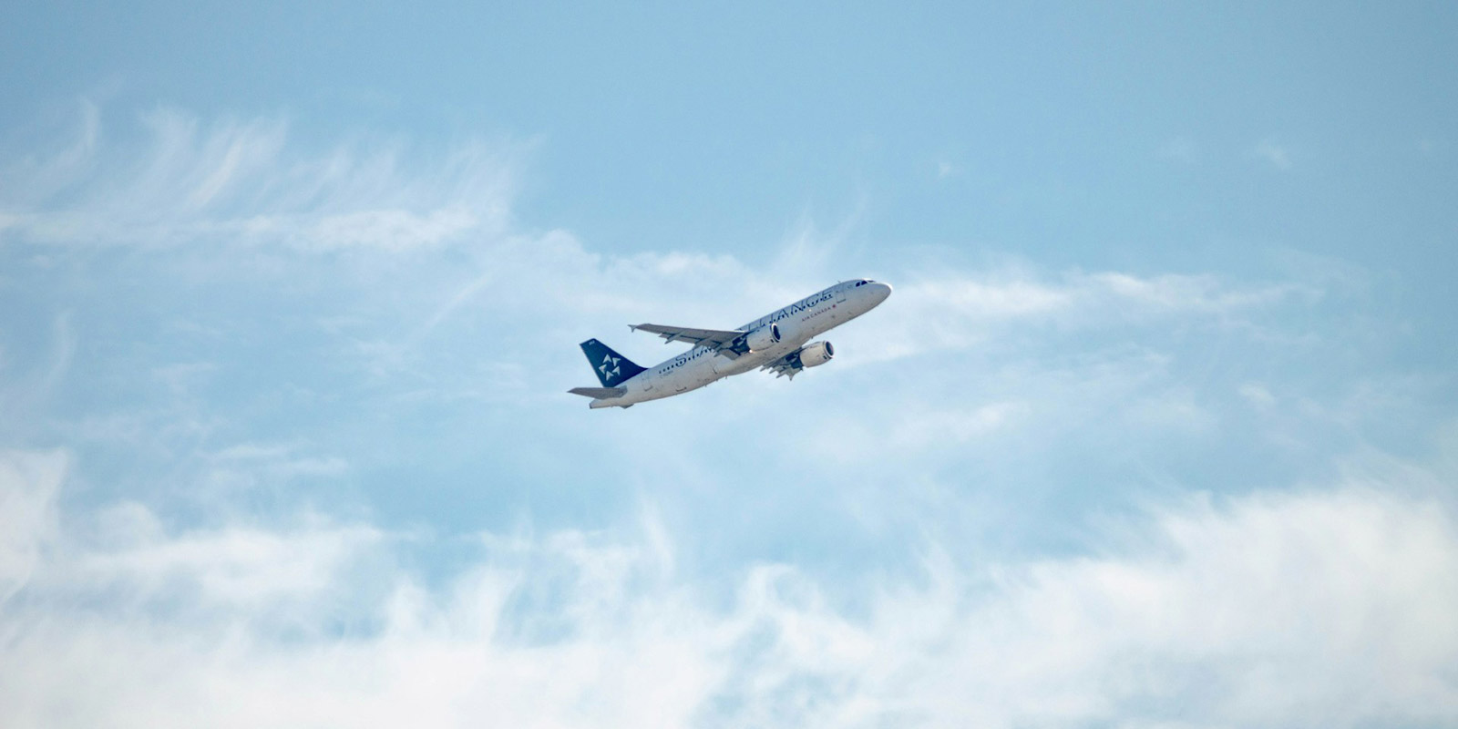 An airplane flying in the sky.