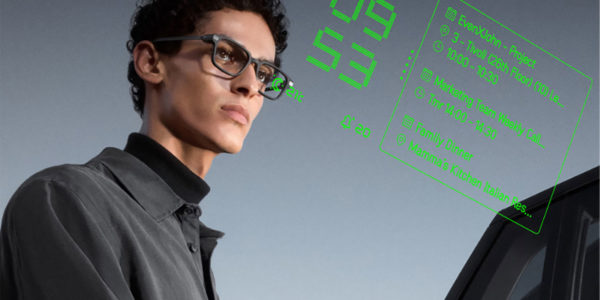 Smart_Glasses_Augmented_Reality_Schedule_Display_Modern_Tech_Wearable_For_Productivity Man wearing smart glasses with green augmented reality interface showing calendar events and digital schedule overlay