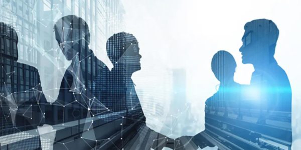 Business_Partnership_Handshake_Digital_Network_Overlay_Technology_Collaboration_Concept_In_Corporate_Environment Abstract image of business professionals shaking hands with digital network overlays and city buildings symbolizing technology collaboration